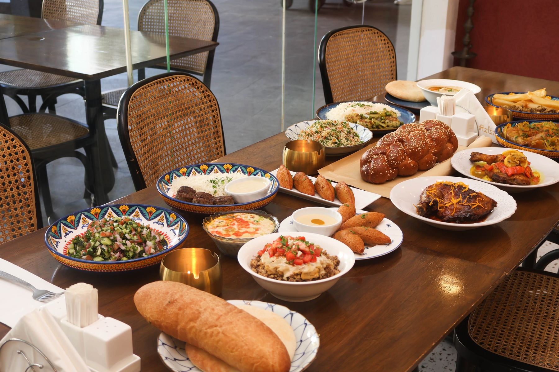 A full table of mezze and mains